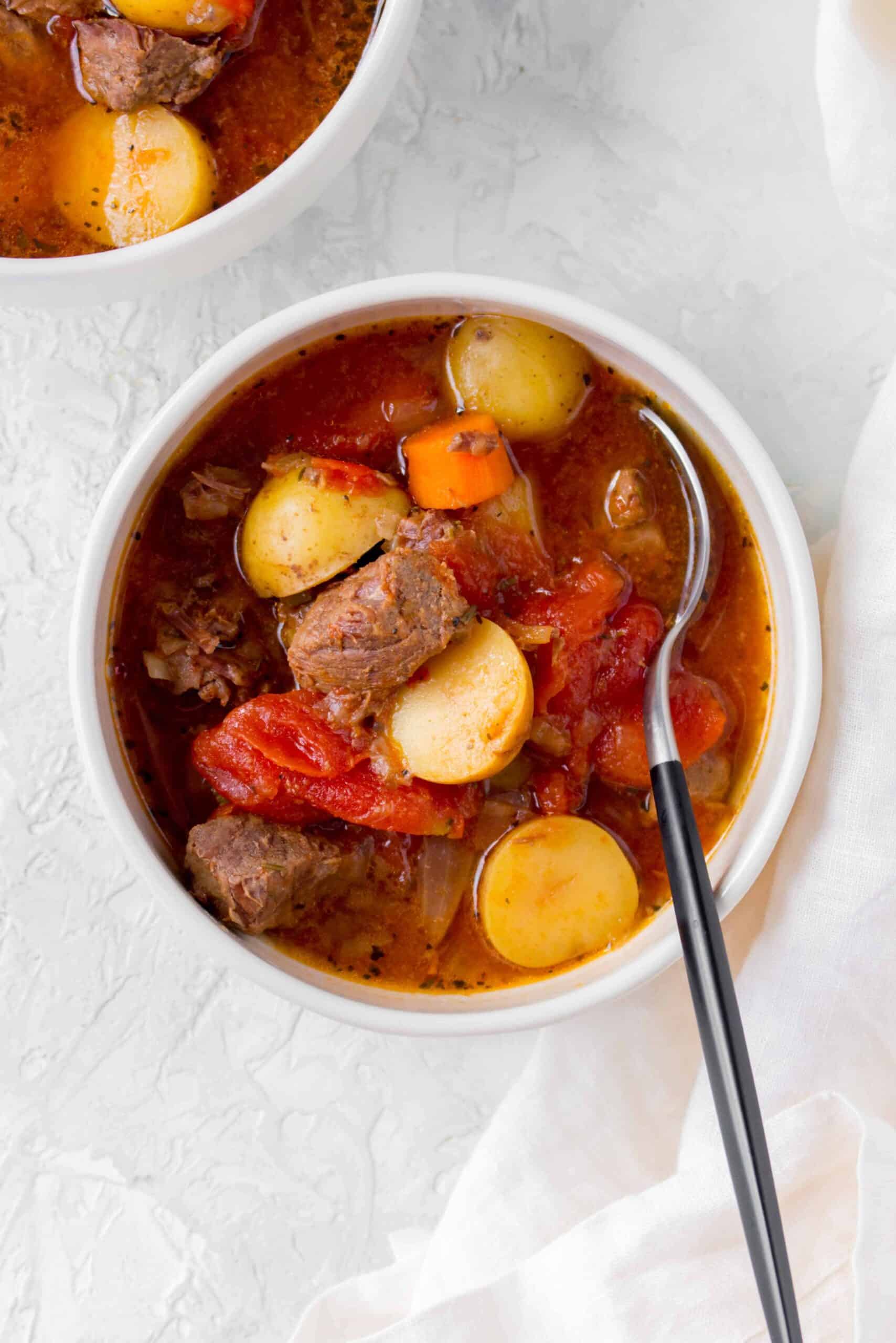 This classic hearty Beef and Tomato Soup warms you up inside out. A childhood favourite, this beef and tomato stew can be made with the Instant Pot or on the stove top!