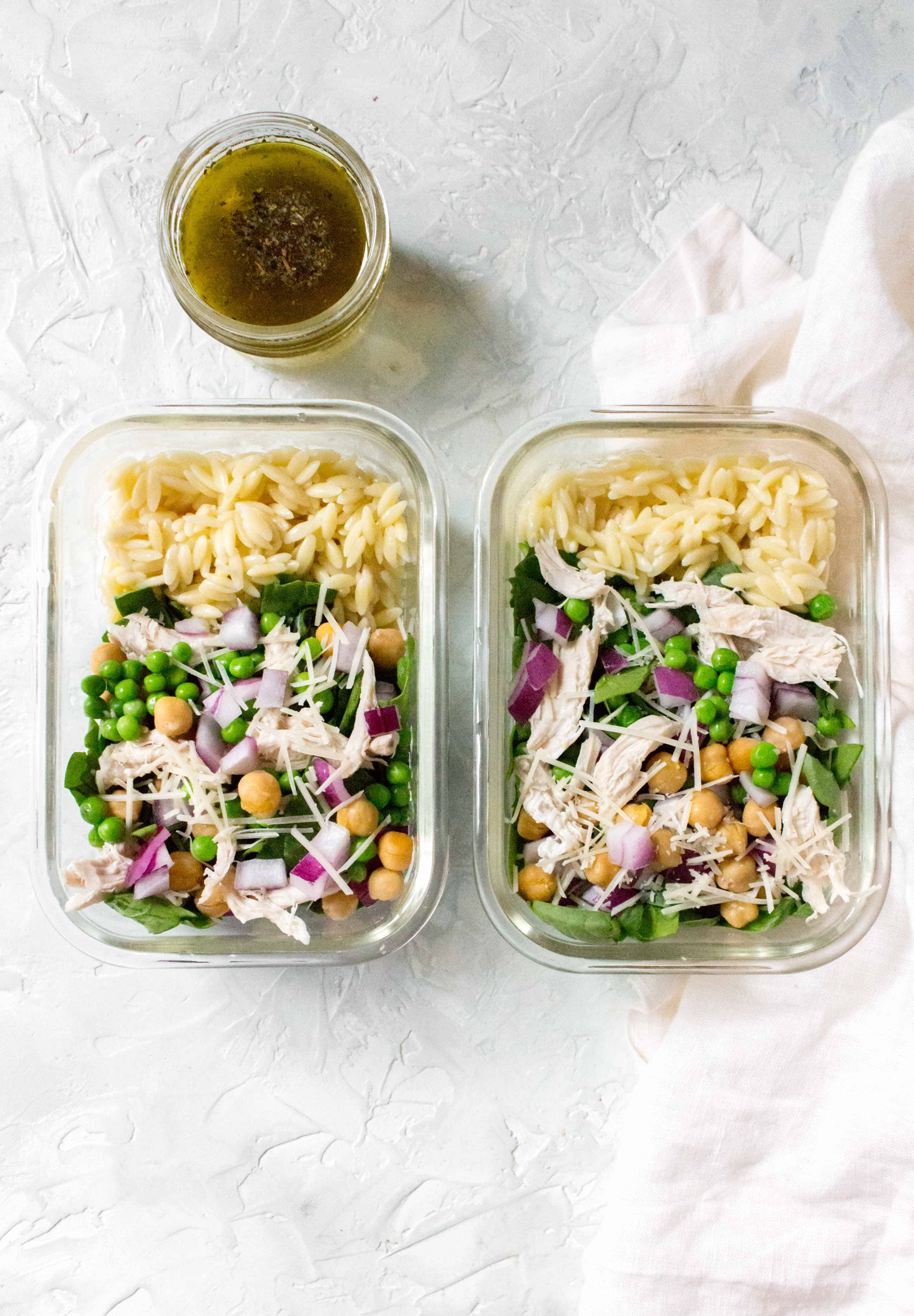 Salads don't have to be boring! Here's a delicious and hearty Orzo Salad Meal Prep for you to try this week! This orzo meal prep is the perfect cold work lunch as its filling and packed with healthy goodness!