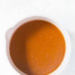 This Homemade Enchilada Sauce packed with flavour and is so simple to make. It's also freezer friendly so you can make a double batch and freezer half for later!