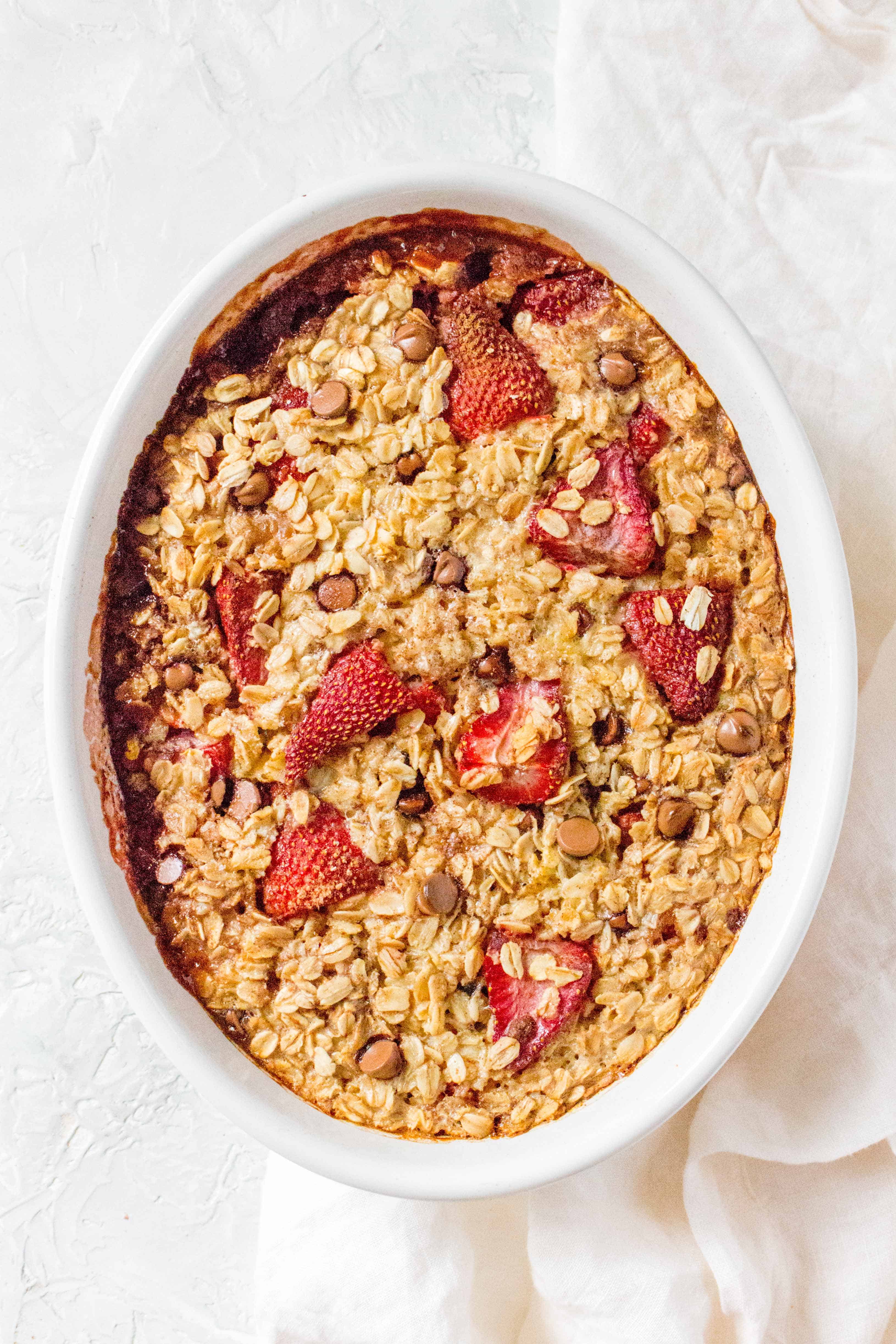 This Strawberry with Chocolate Oatmeal Bake is the perfect breakfast! The pop of colour makes for a pretty looking breakfast for a special occasion but simple enough to work as a weekly meal prep!