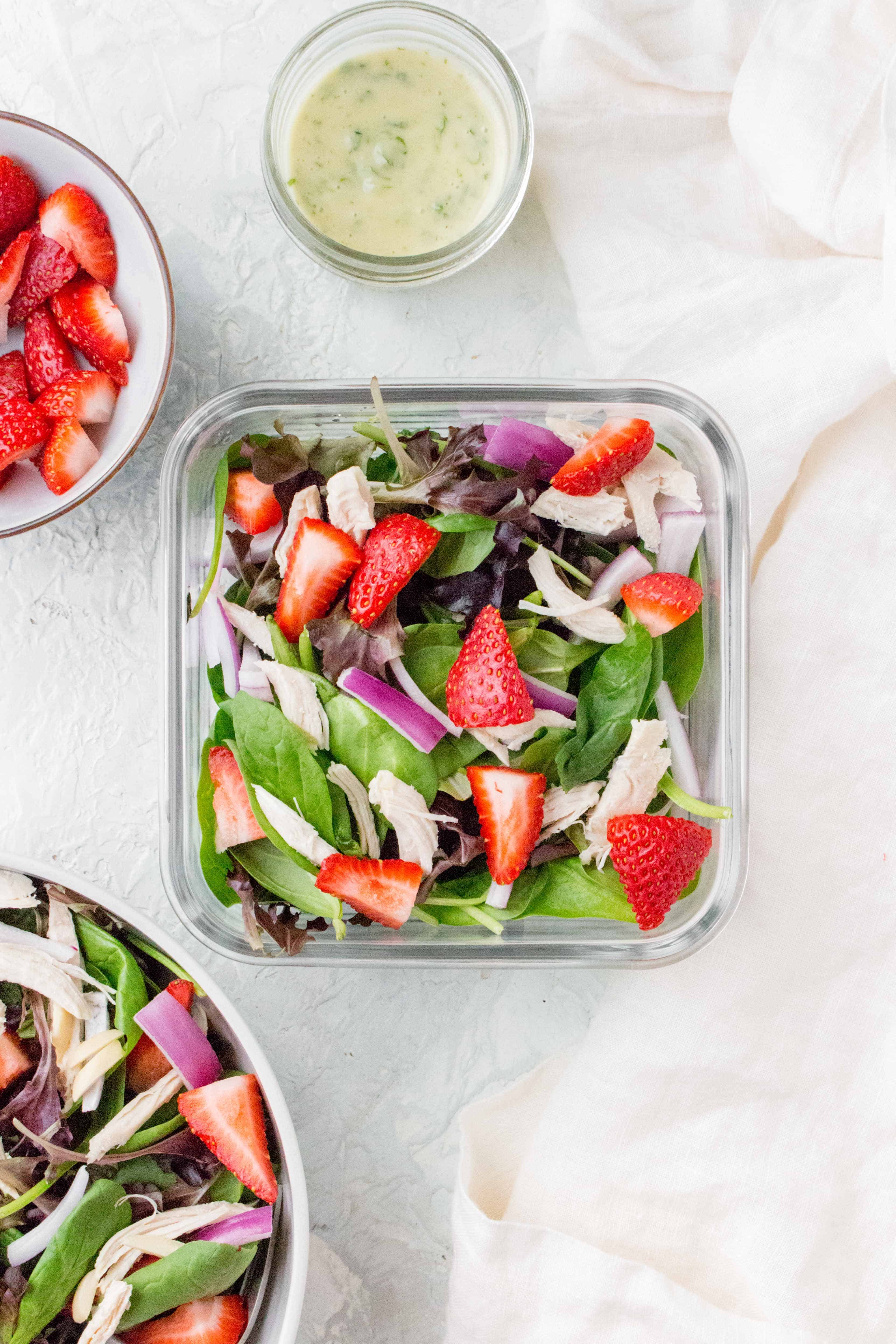 Refreshing and bright, this Chicken Strawberry Avocado Salad is a not-boring salad that works as the perfect cold lunch idea, light dinner, or as a potluck dish! 