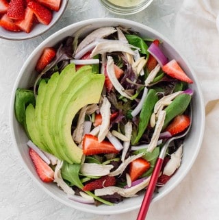 This Chicken Strawberry Avocado Salad is a not-boring salad that works as the perfect cold lunch idea, light dinner, or as a potluck dish! 