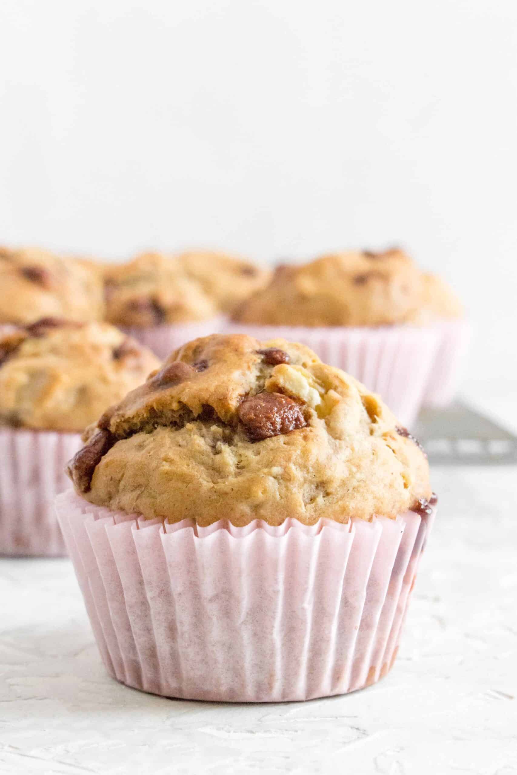 banana chocolate chip muffin in pink muffin liner