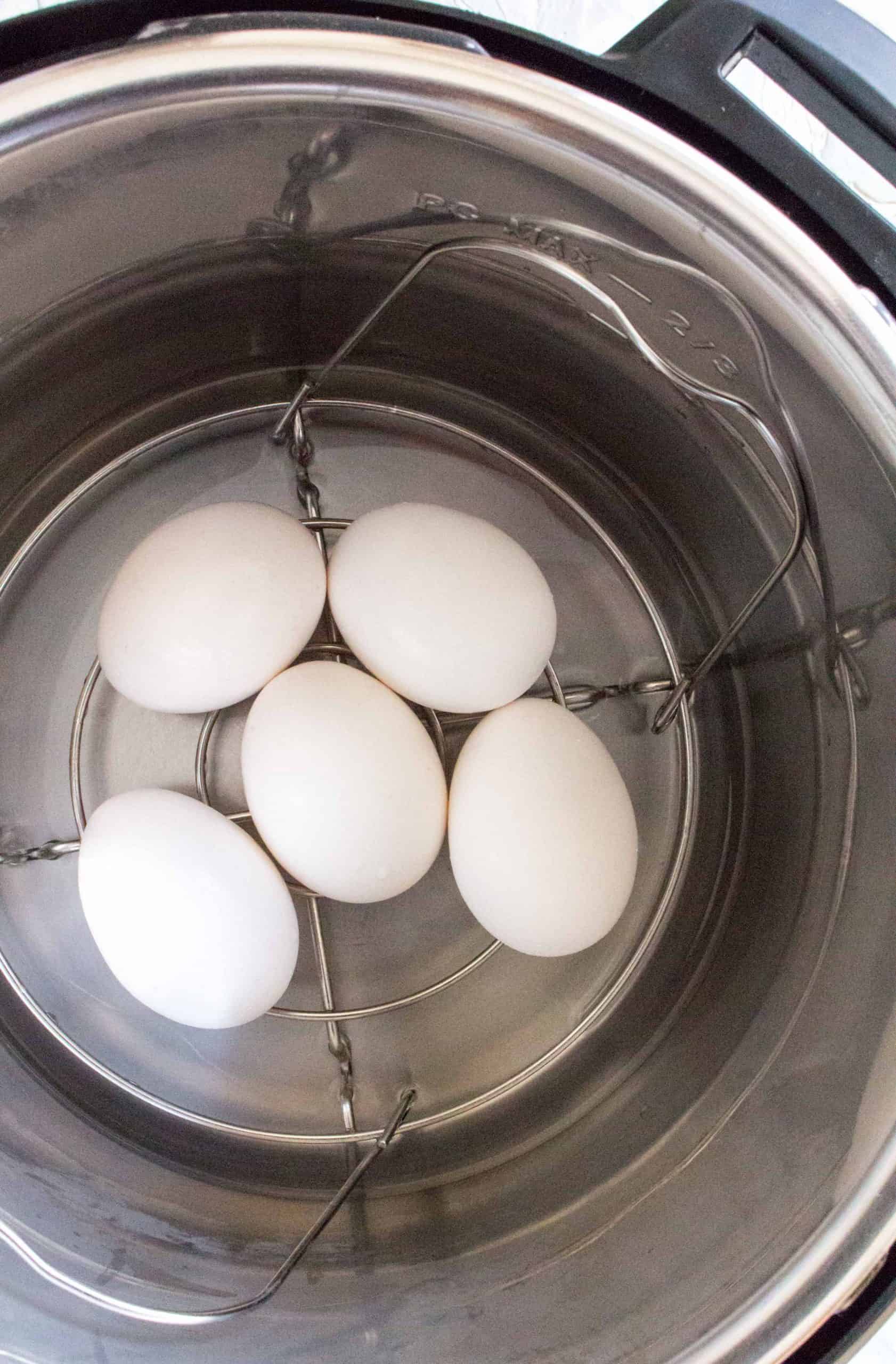 eggs inside of an instant pot on a trivet