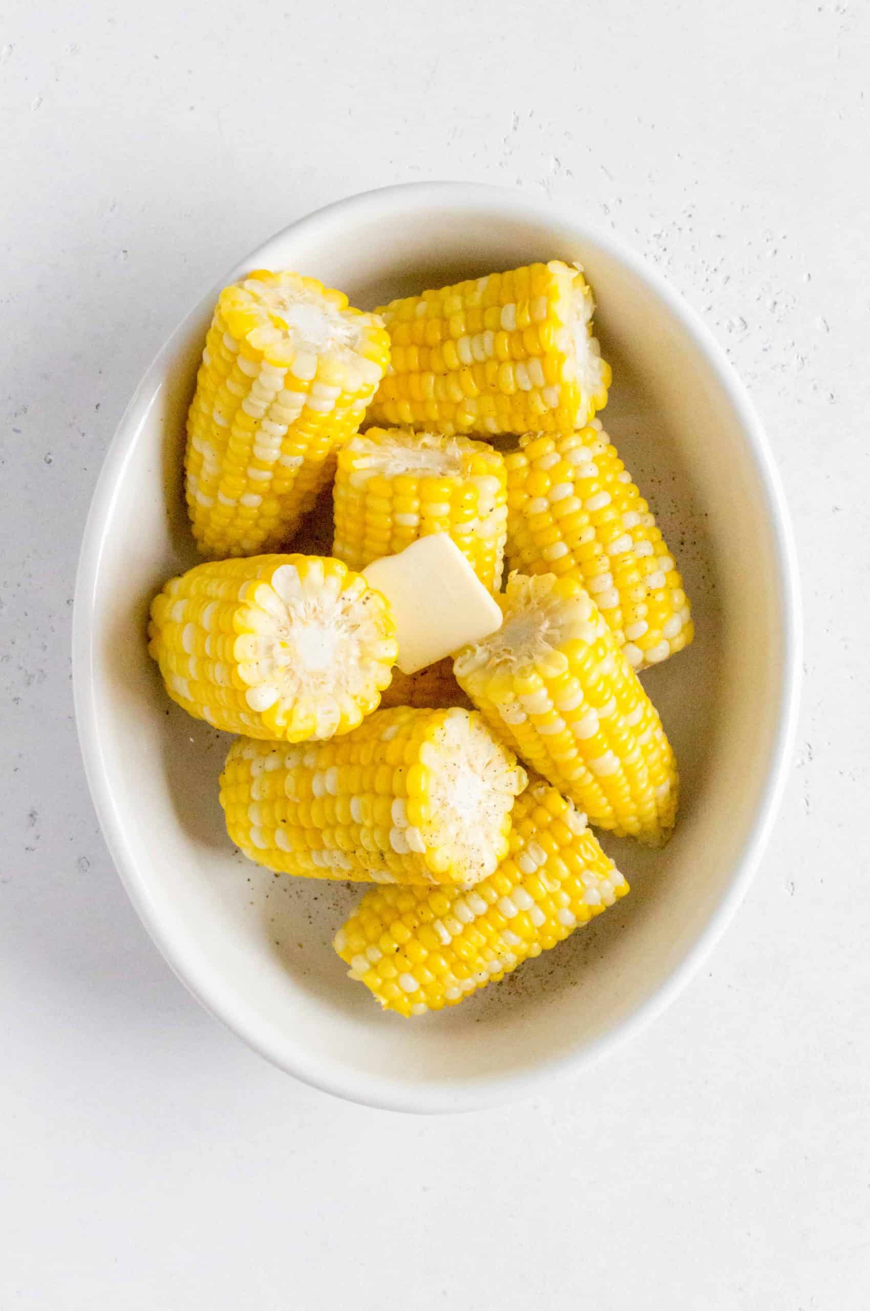 I love to keep it simple by adding some freshly cracked black pepper and butter onto the corn.