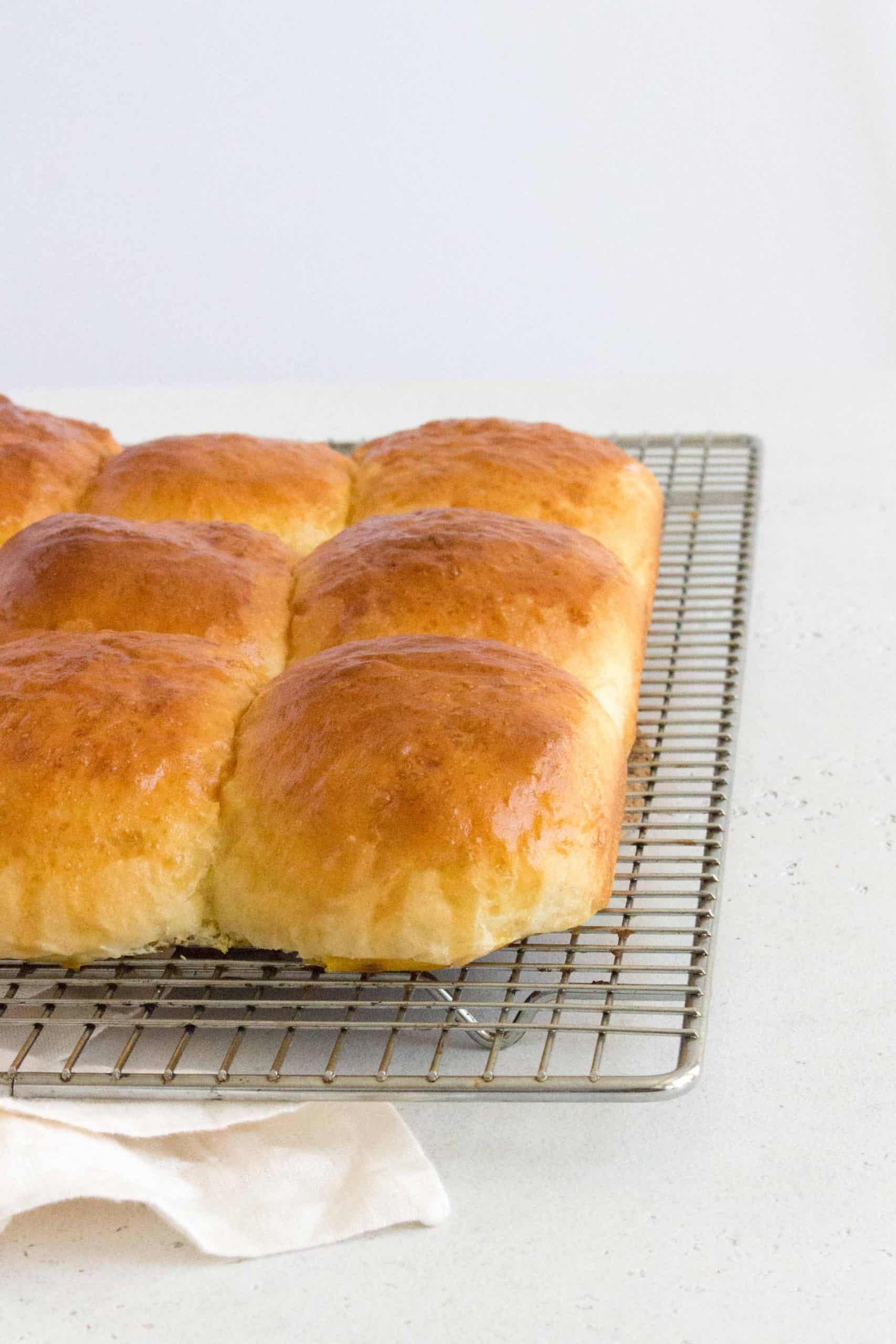 Here's how you can make fluffy, pillowy soft Hokkaido style milk bread rolls at home with this simple recipe. The perfect make ahead bread as they stay soft for days! Try these Japanese Milk Bread Rolls tonight!