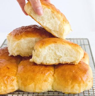 Here's how you can make fluffy, pillowy soft Hokkaido style milk bread rolls at home with this simple recipe. The perfect make ahead bread as they stay soft for days!
