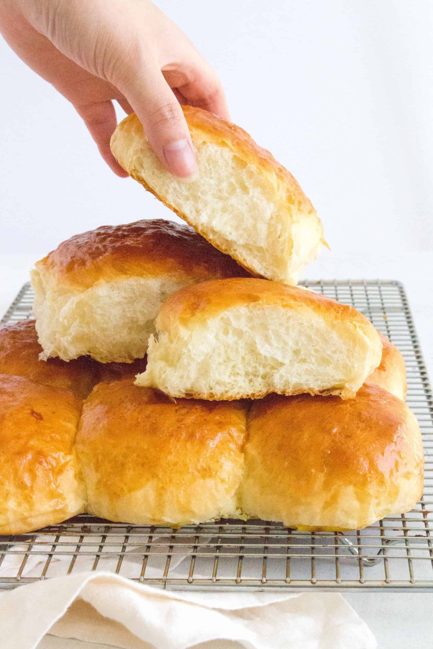 Here's how you can make fluffy, pillowy soft Hokkaido style milk bread rolls at home with this simple recipe. The perfect make ahead bread as they stay soft for days!