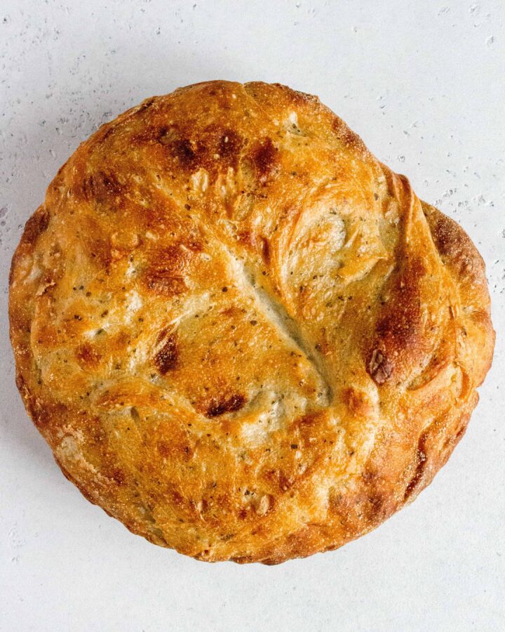 This easy Basil and Garlic No Knead Bread has a crispy exterior and soft interior! It's so simple and only takes a couple minutes to put together. No mixer needed.