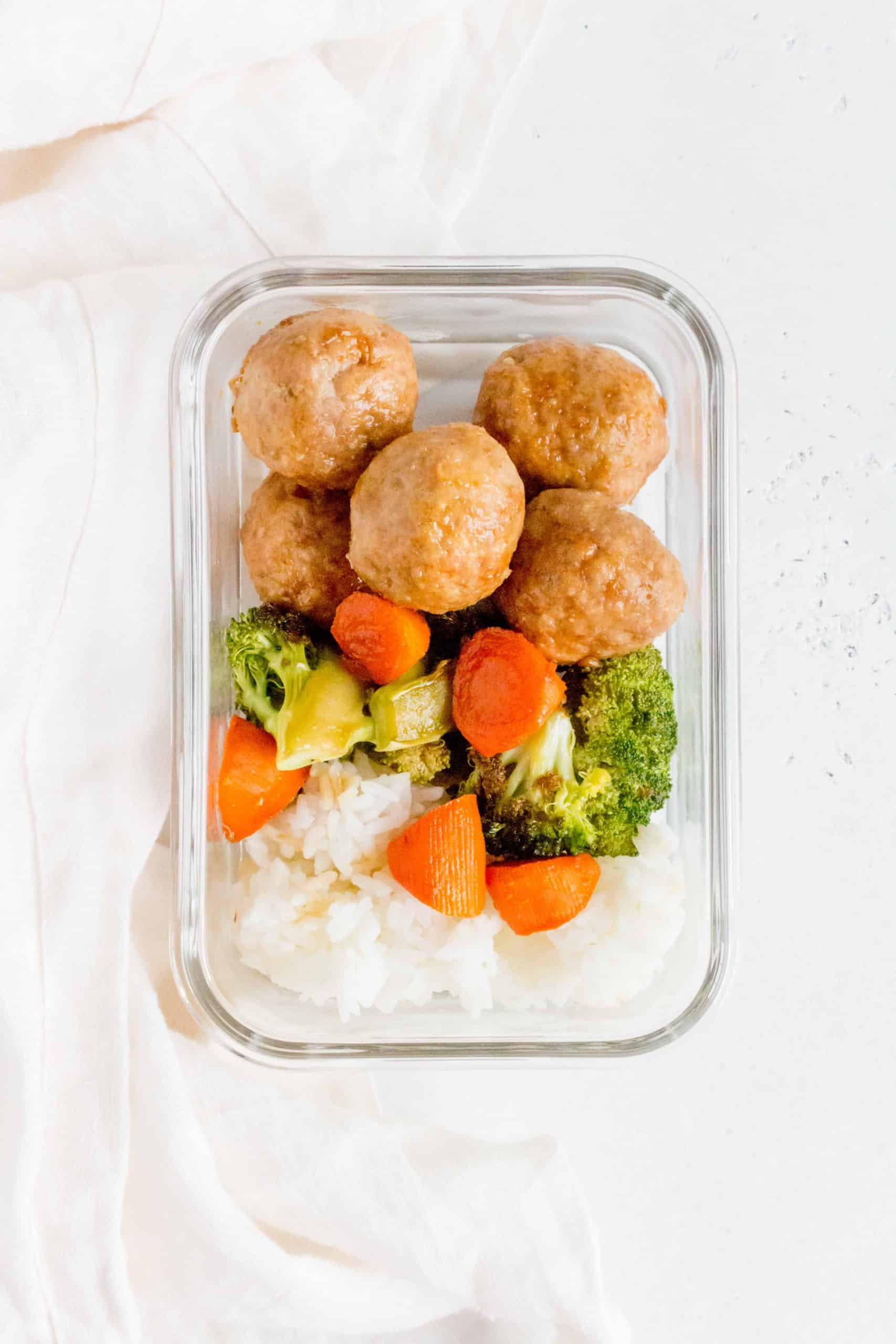 Sweet and tangy, these Chicken Teriyaki Meatballs with Broccoli and Carrots is better than takeout! Make them at home today or freeze them for later.