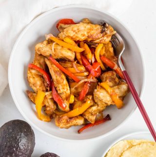 Have dinner ready on the table in less than 30 minutes with this quick and healthy Air Fryer Chicken Fajitas! 
