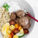 These healthy and delicious Greek Meatball served with a side of quinoa and tzatziki sauce are perfect dinner or meal prepping! The Greek meatballs are freezer friendly and full of flavour!
