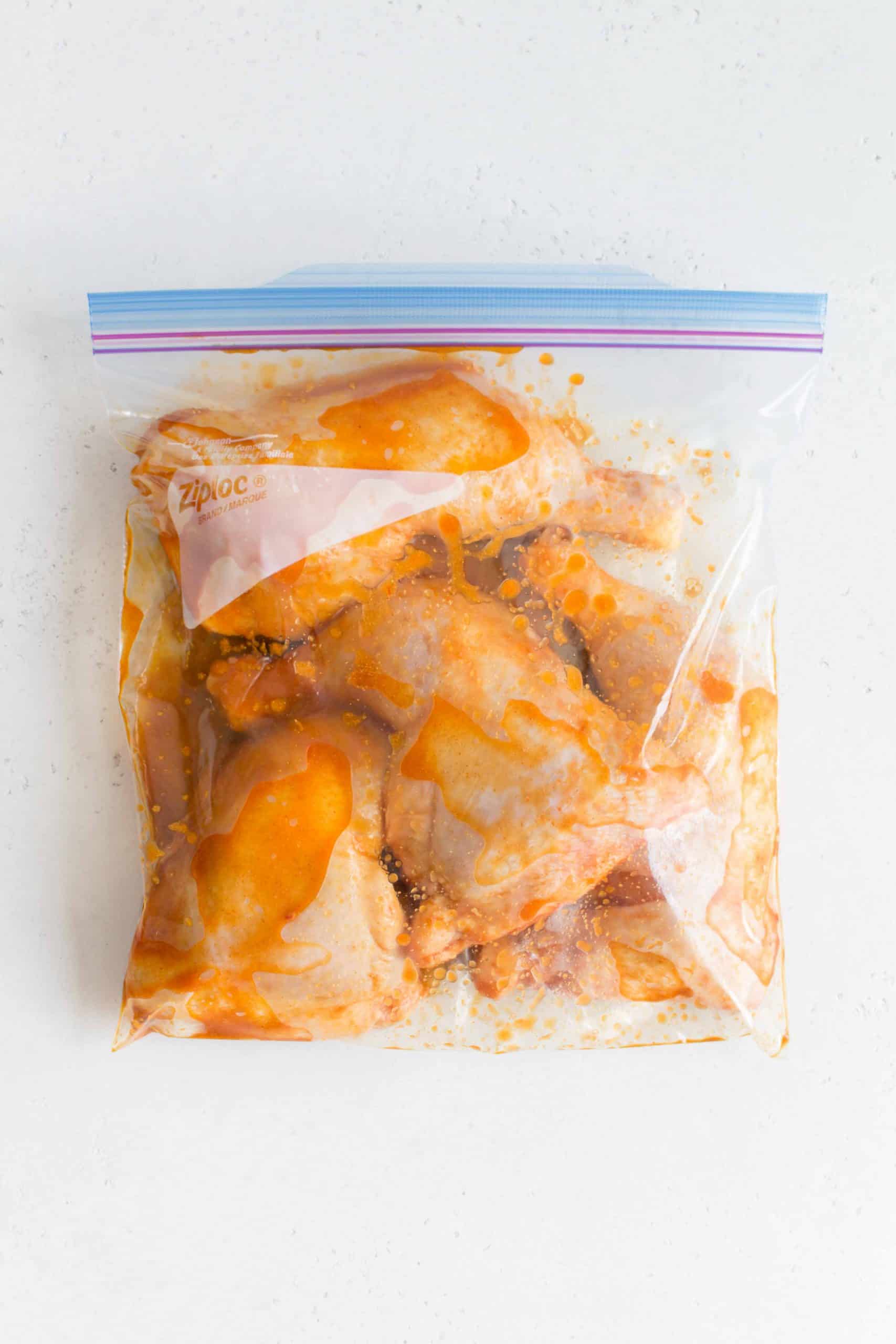 freezer bag with marinating chicken legs