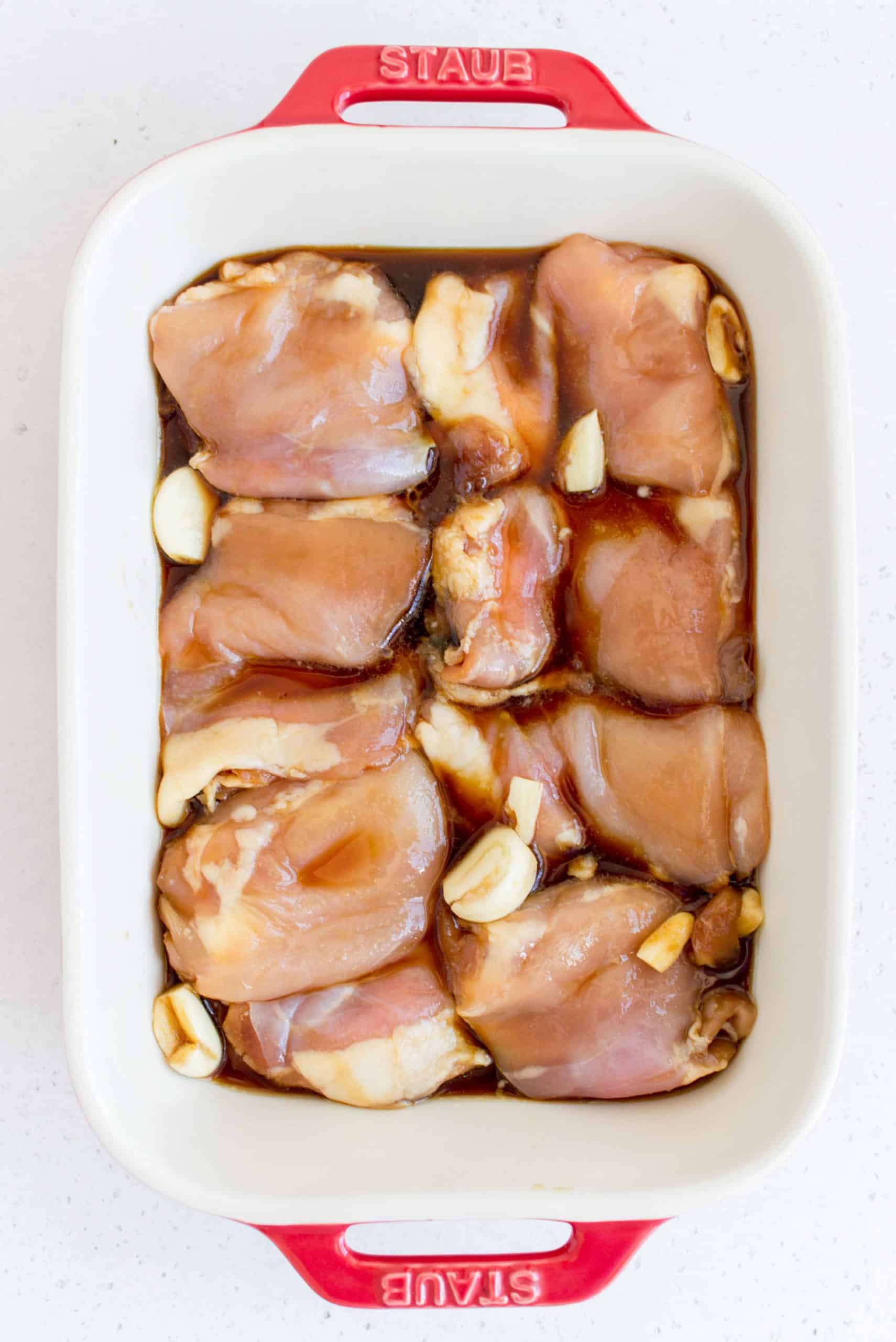 chicken thighs in a baking dish