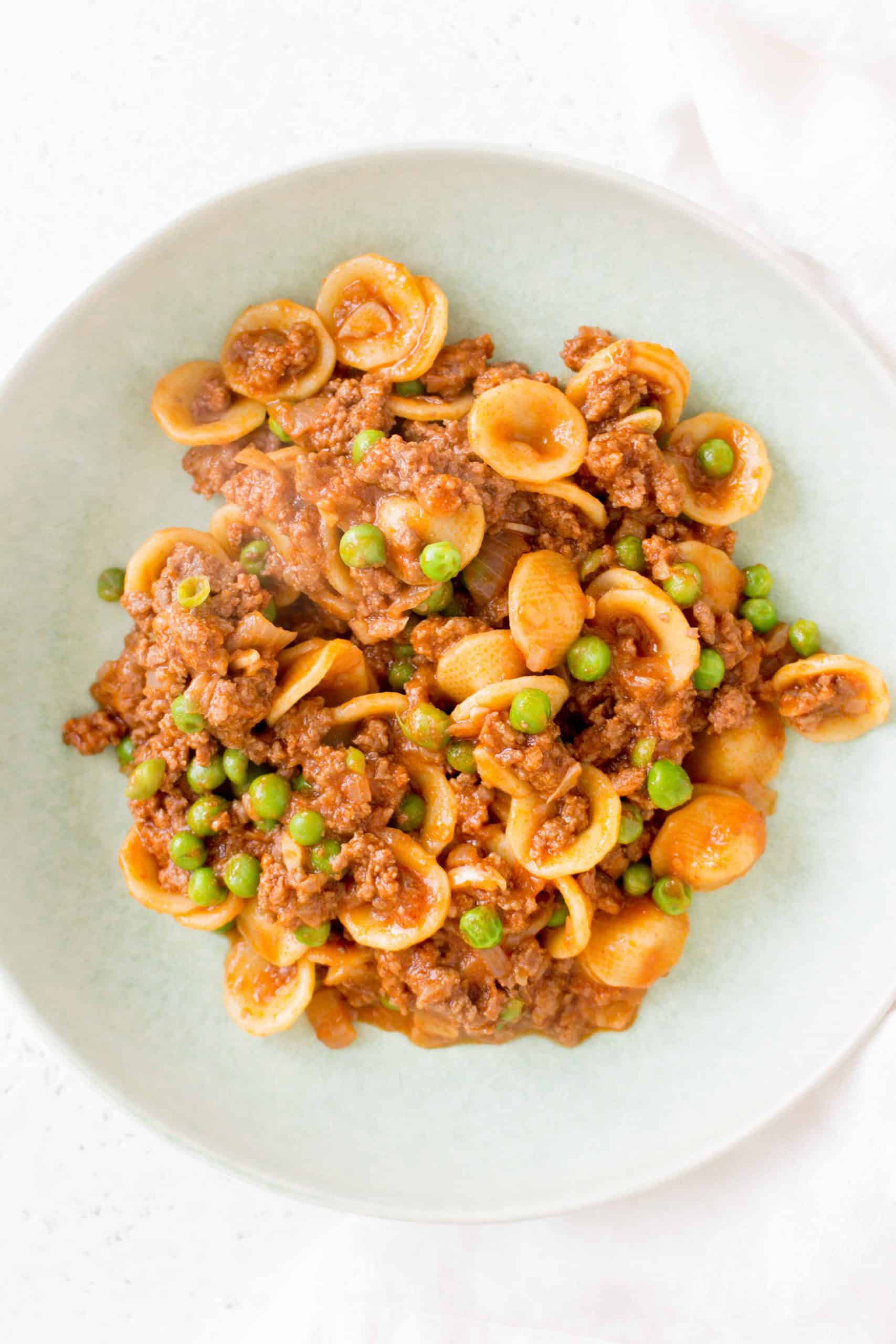 A plate of Orecchiette Pasta with Beef and Peas.