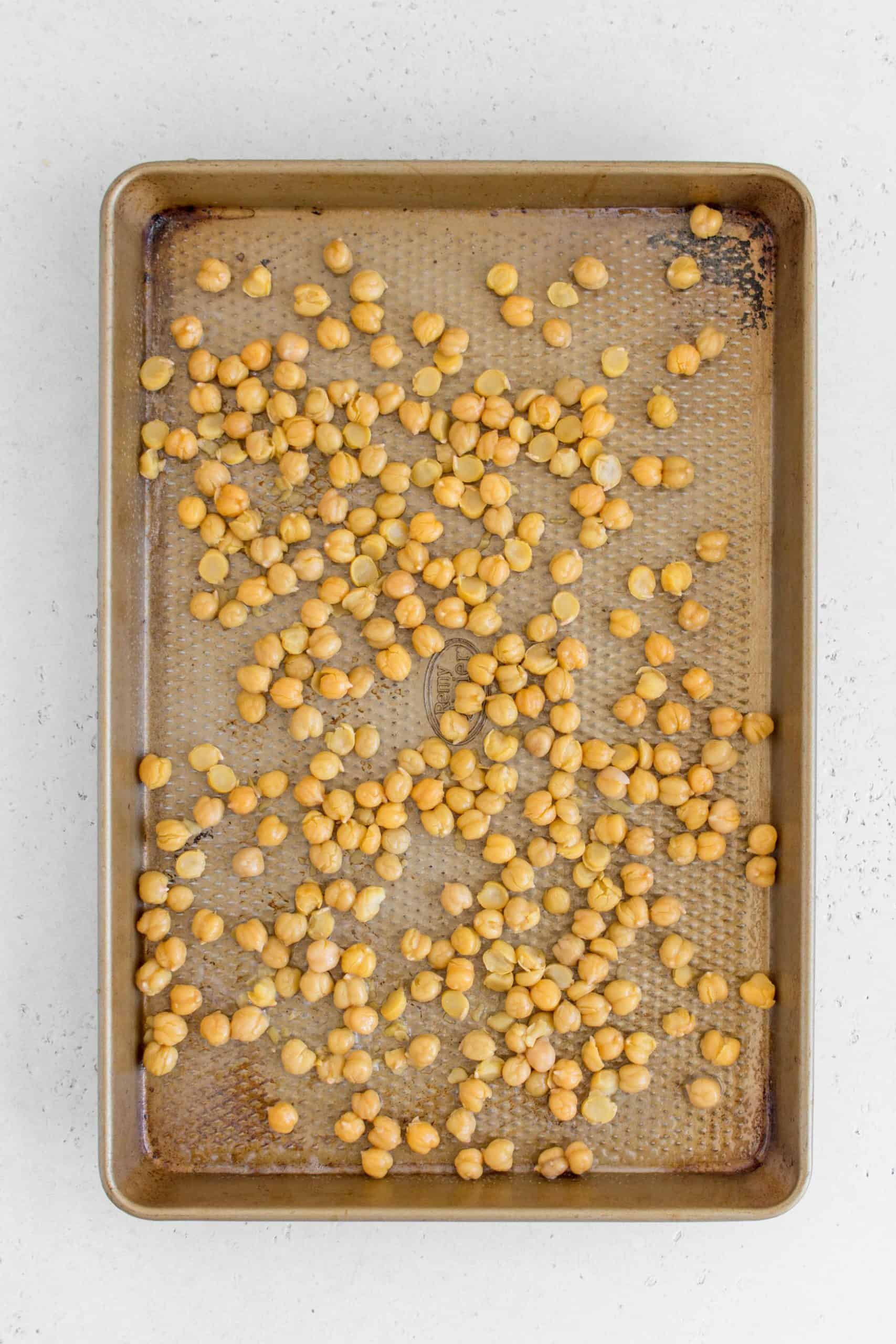 chickpeas on a sheet pan before roasting.