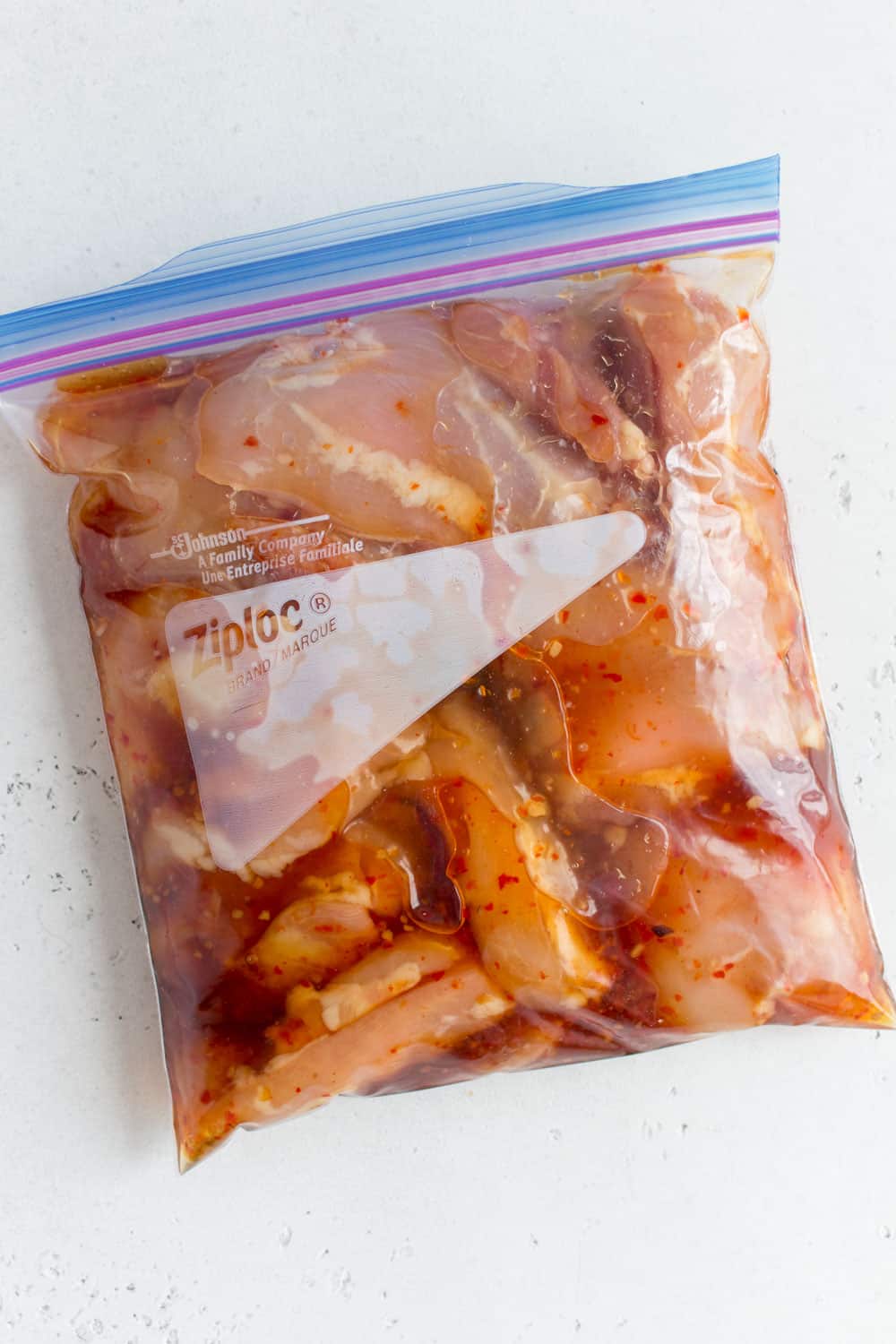 freezer bag with sweet thai chili chicken marinating