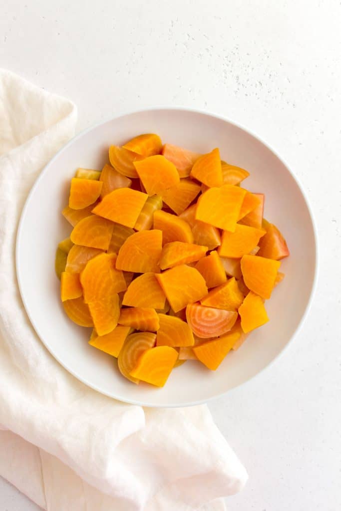 plate of golden beets cooked in the slow cooker