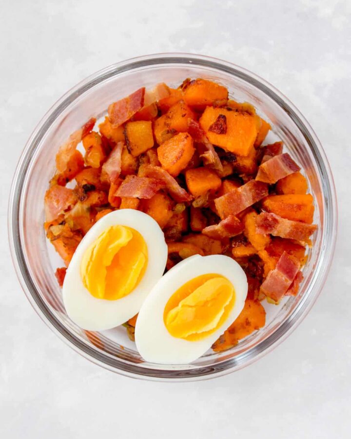 A meal prep container with a paleo breakfast.