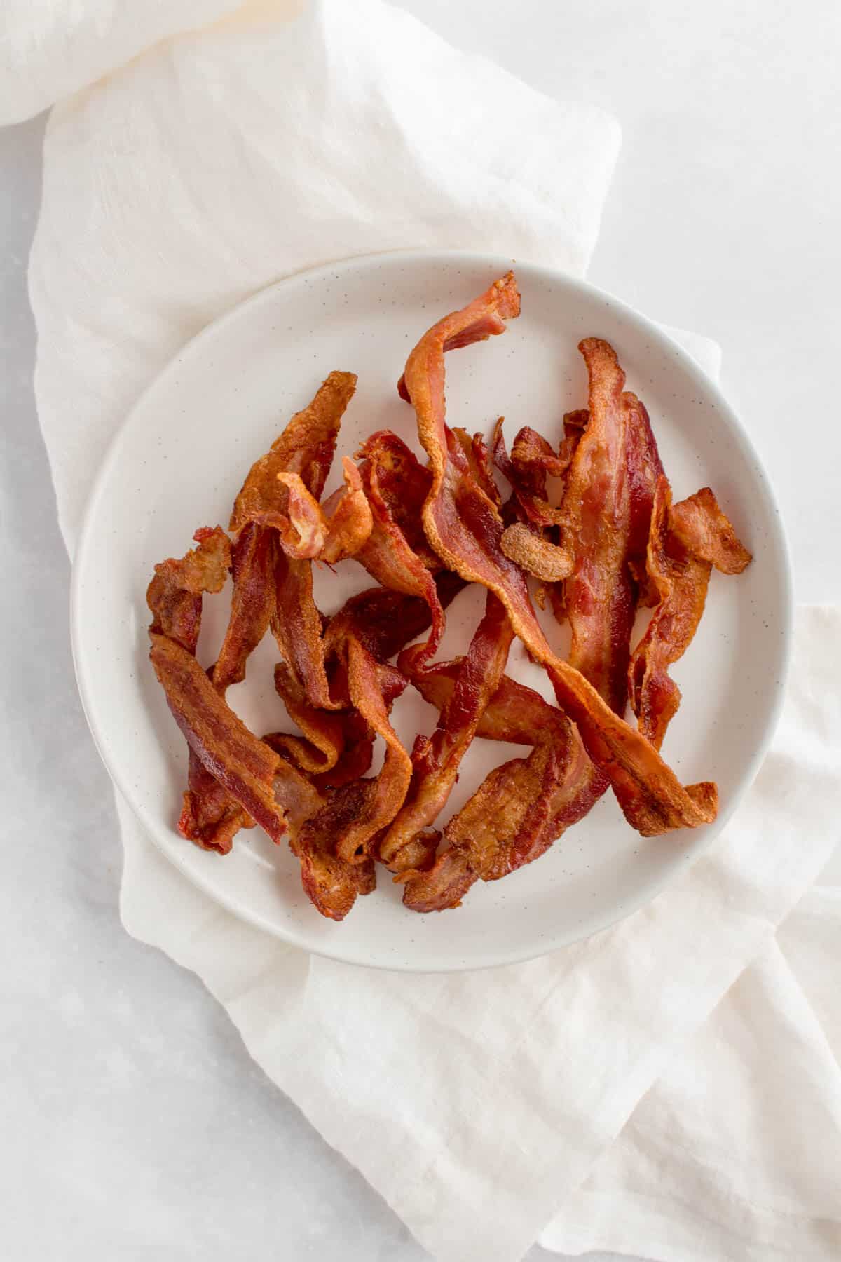 A plate of air fryer bacon.