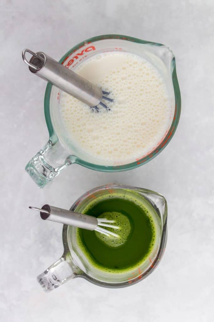 Mixing milk with honey and matcha with water.