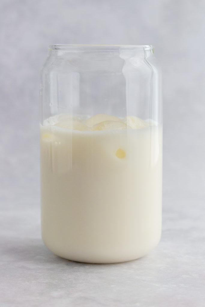 Glass with sweetened milk added.