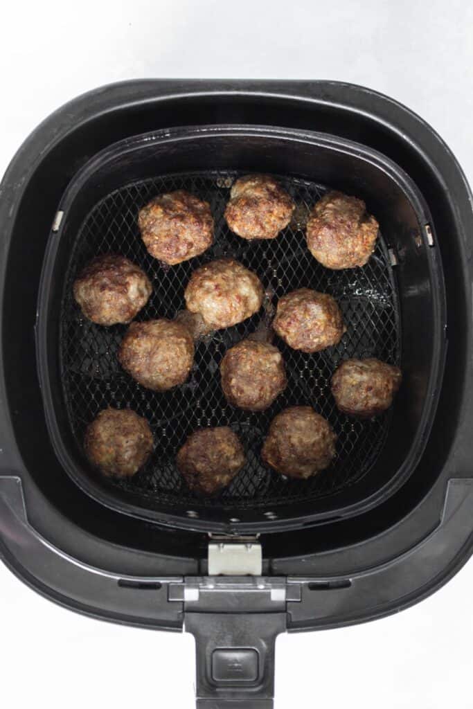 Meatballs cooked in an air fryer.