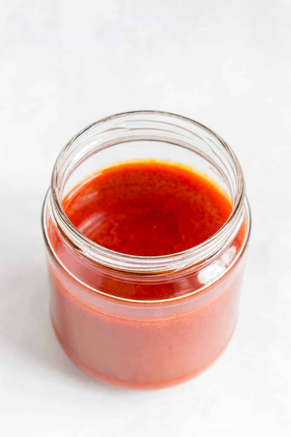 A jar of buffalo sauce.