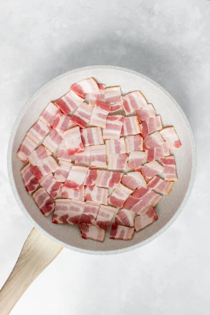 Bacon in a skillet.