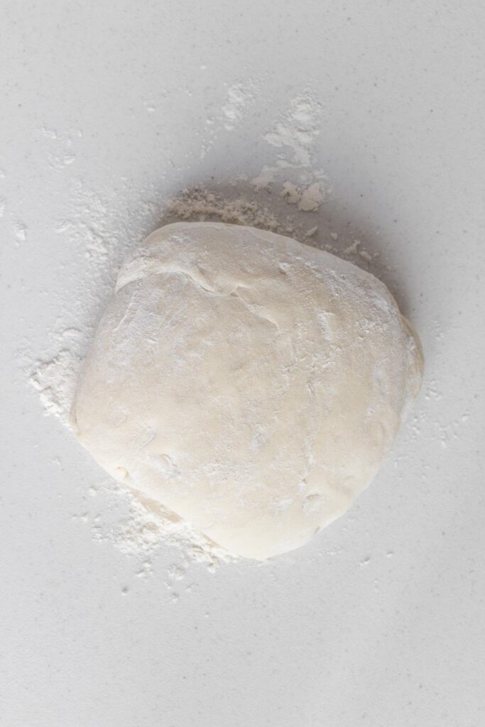 Dough on a lightly floured surface.