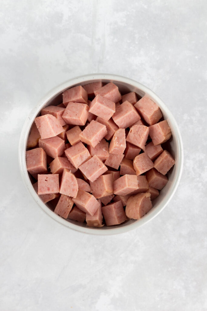 Overhead view of spam, cut into cubes.