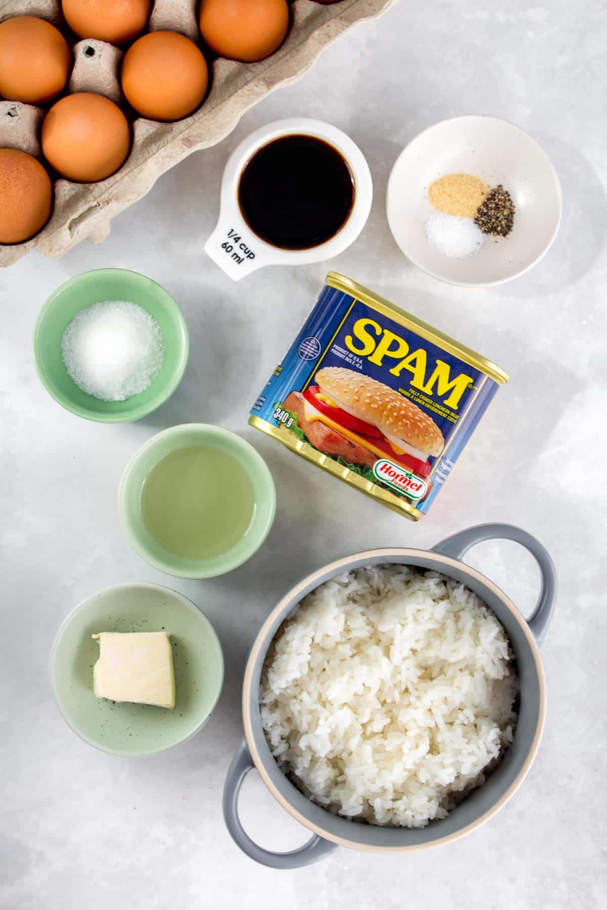 Ingredients for spam, eggs, and rice recipe.