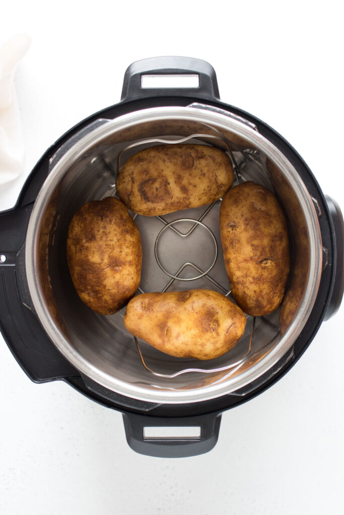 Potatoes added to an Instant Pot.