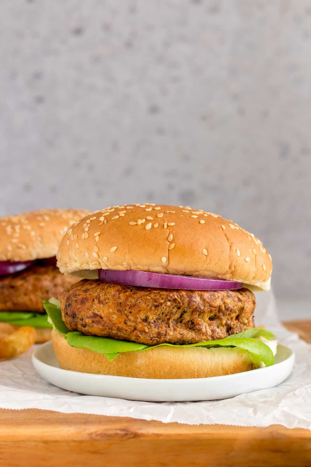 Profile view of an air fryer turkey burger from frozen.