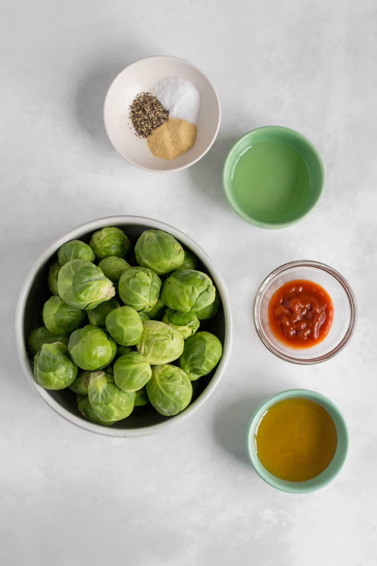 Ingredients needed to make honey sriracha brussels sprouts.
