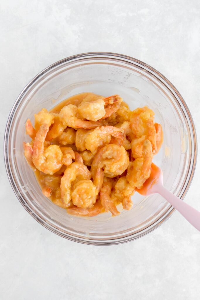 Shrimp added to the sauce for honey walnut shrimp.