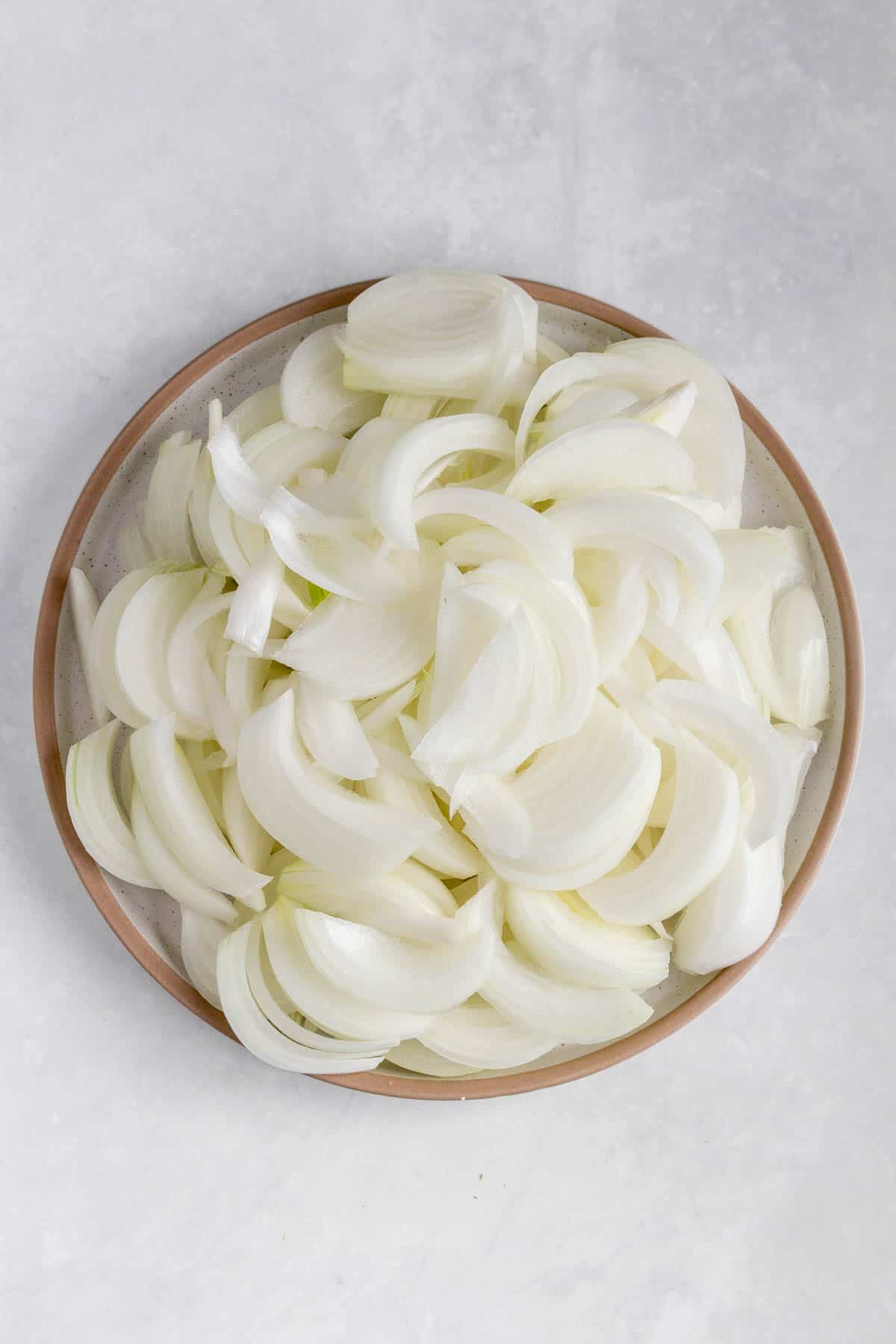 Sliced onions in a plate.