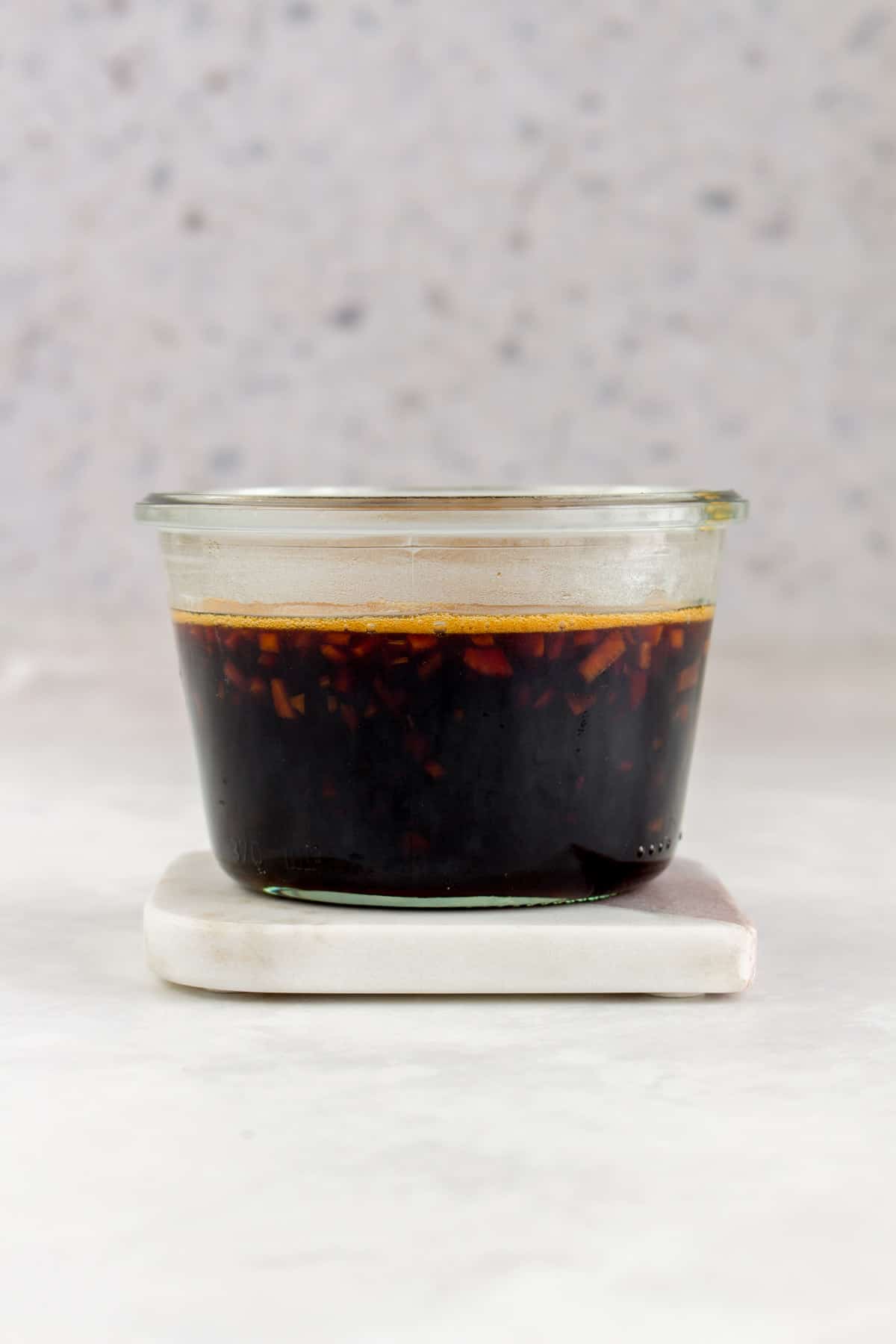 A jar of teriyaki sauce.