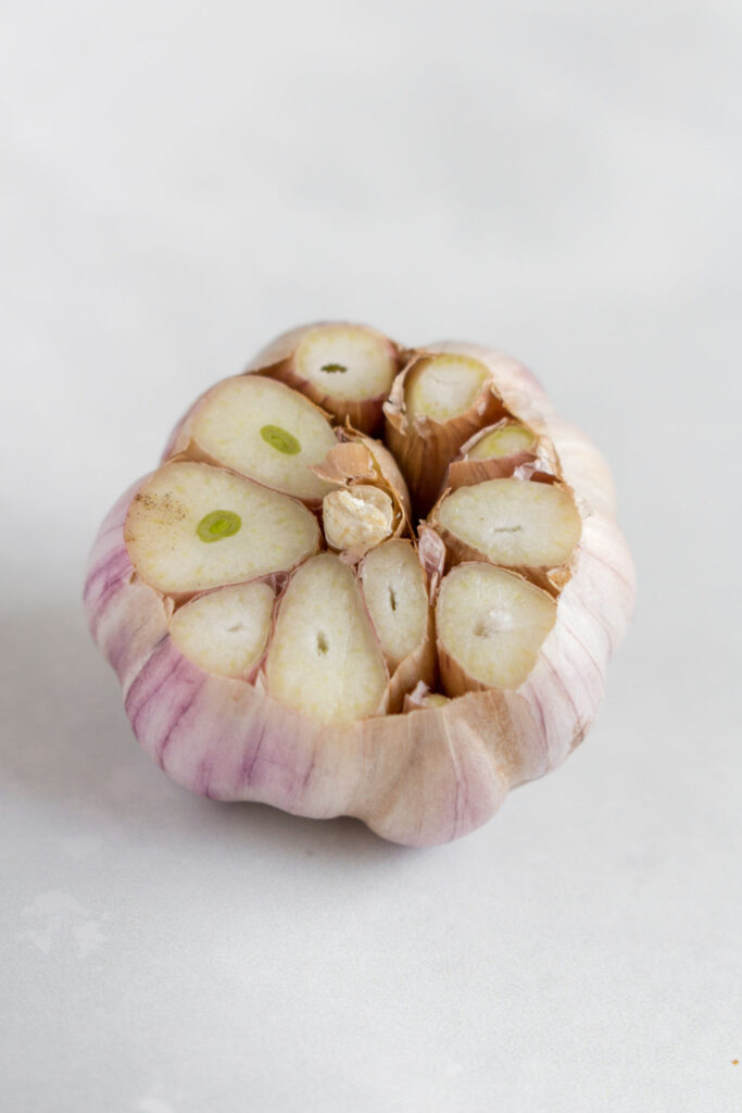 Cut garlic head.