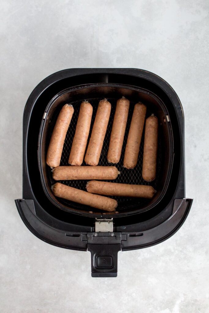 Sausage links in an air fryer.