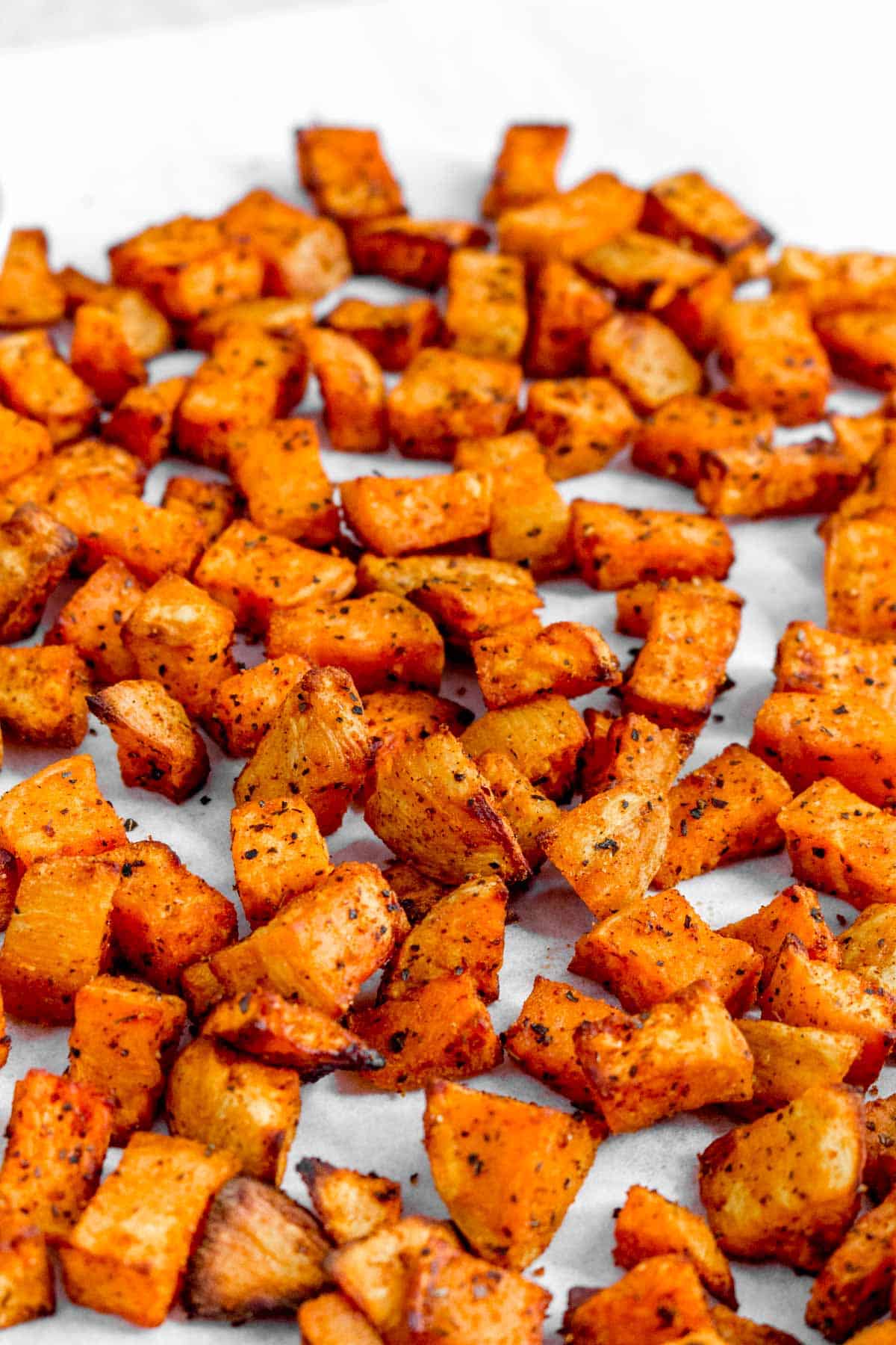 Close up of cubed sweet potatoes that were air fried.