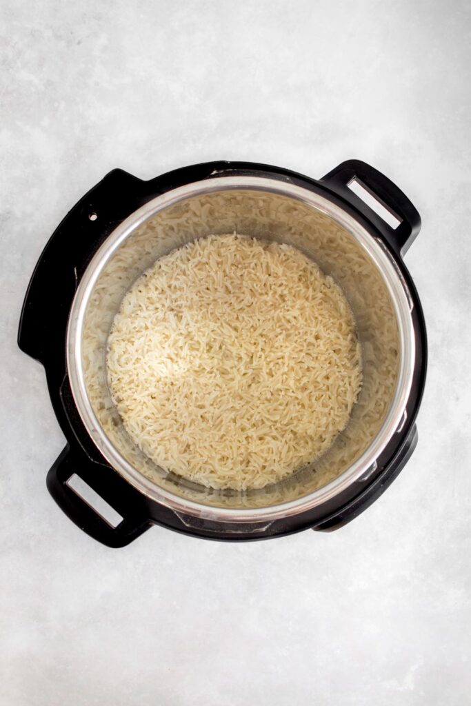 An instant pot with basmati rice.