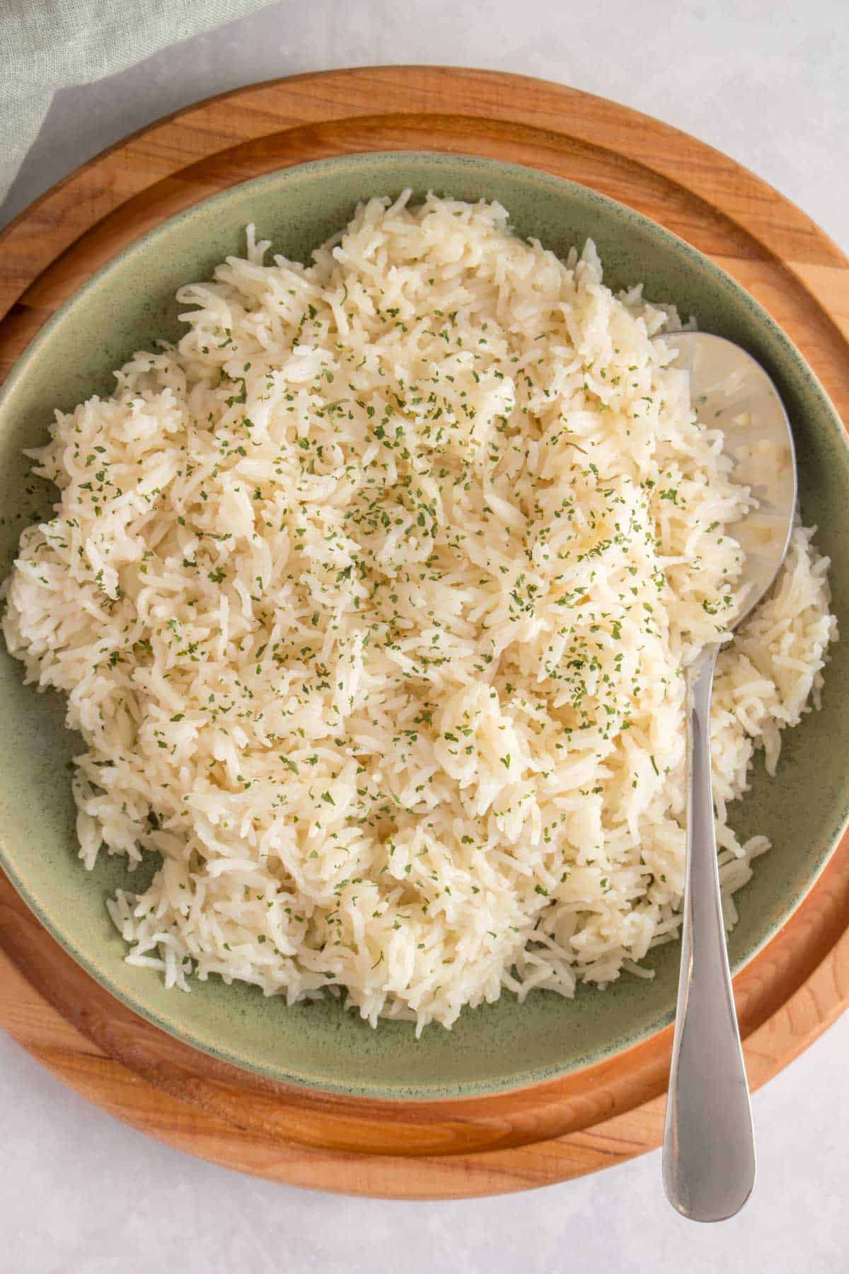 Close up of a plate of instant pot basmati rice with a spoon.