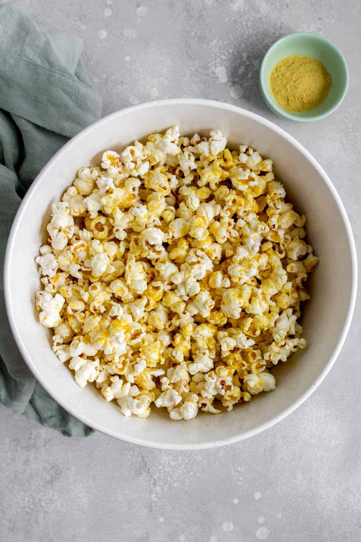 A bowl of nutritional yeast popcorn.
