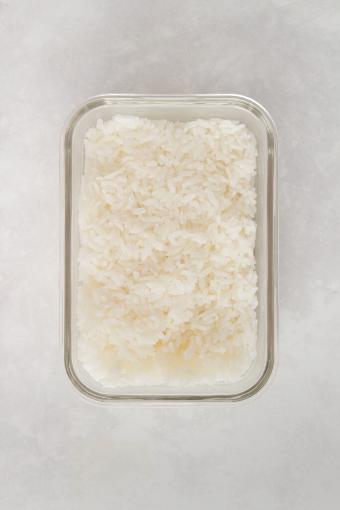 Rice in a meal prep container.