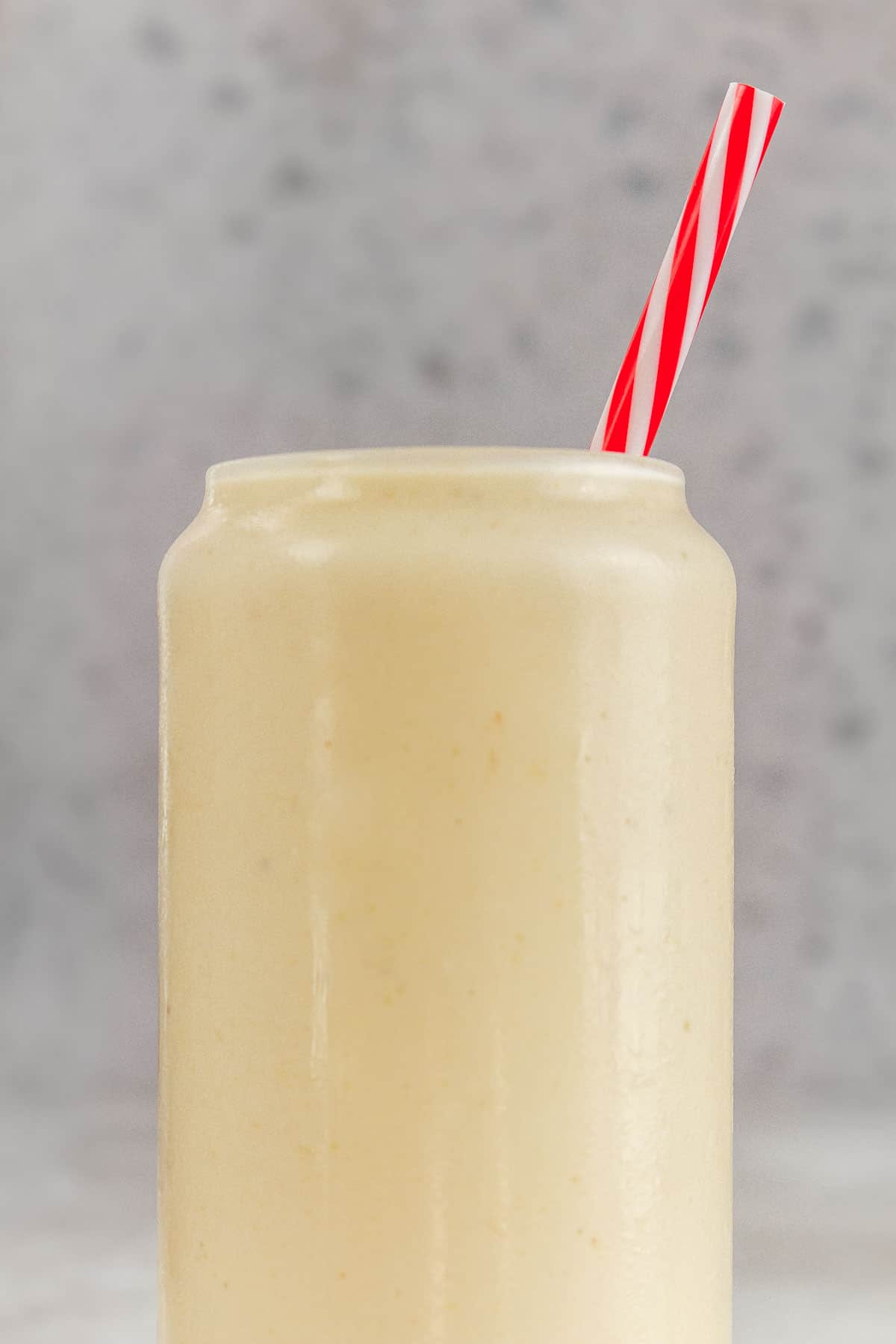 Close up of a pineapple banana smoothie.