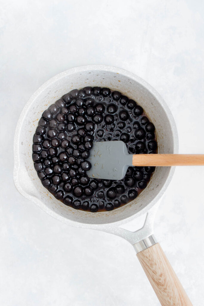 Tapioca and brown sugar syrup in a pot.