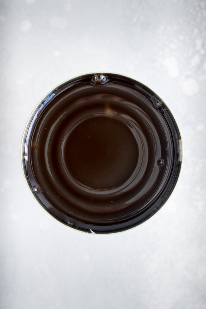 Overhead view of a can of grass jelly.