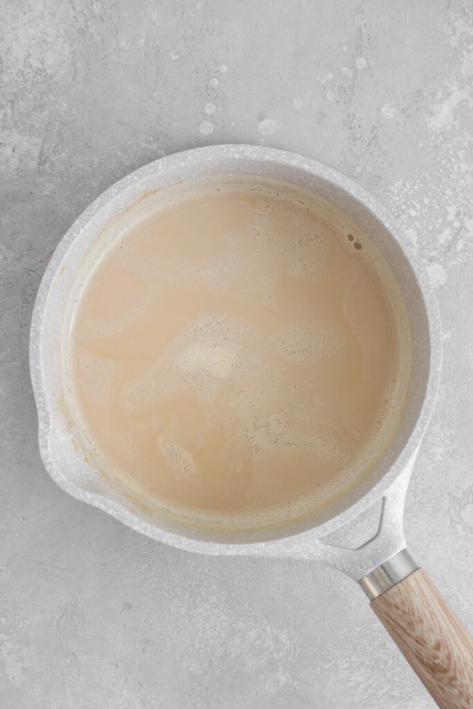 Brown sugar milk tea in a saucepan.