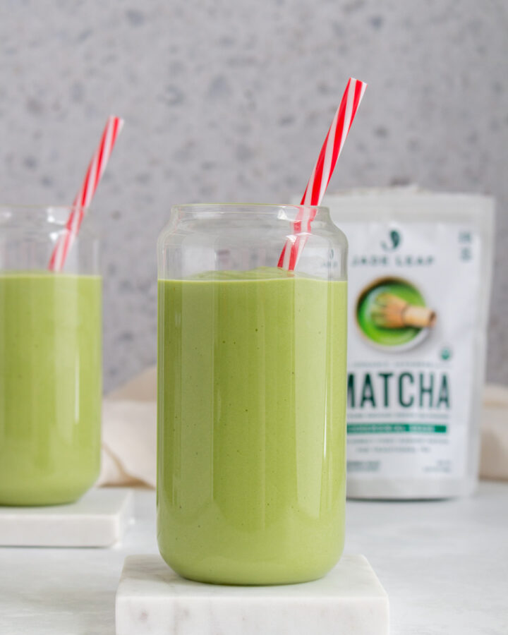 Two glasses of matcha avocado smoothies.